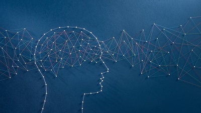 Side profile of a human head outlined with interconnected nodes and lines, symbolizing neural or network connections, set against a blue background with the network extending outward to suggest information flow.